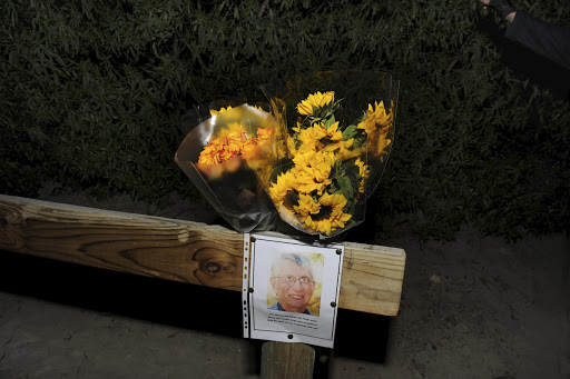 The site where Dr. Louis Heyns' body was found on May 31, 2013, in Strand, South Africa. Heyns, a doctor at Tygerberg hospital, went missing following a visit to his brother and was found in a shallow grave one week later. File photo.