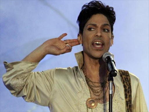 US musician Prince performs at the Hop Farm Festival near Paddock Wood, southern England July 3, 2011. Photo/REUTERS