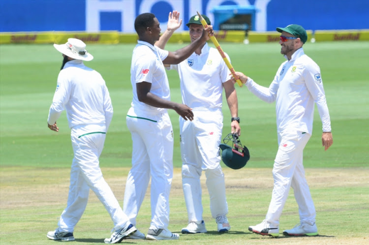 South Africa captain Faf du Plessis hands a stump to Lungi Ngidi after the debutant fast bowler took 6 wickets for 39 runs during day 5 of the 2nd Sunfoil Test match against India at SuperSport Park on January 17, 2018 in Pretoria. South Africa won by 135 runs to take an unassailable 2-0 lead in the three-match Test series. The third and final Test starts at the Wanderers in Johannesburg on Wednesday 24 January.
