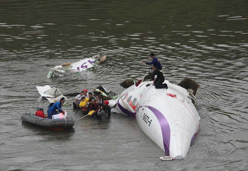 ransAsia Airways GE-235 airline drops into Keelung River and the firefighters are rescuing the passengers on 04th February, 2015 in Keelung, Taiwan, China Picture: GETTY IMAGES