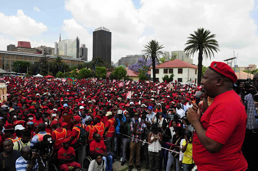 RED ROAD:Thousands of EFF supporters led by Julius Malema marched in the streets of Johannesburg where they gave their grievances to the Reserve Bank, Chamber of Mines and the JSE in Sandton Report Picture: THULANI MBELE