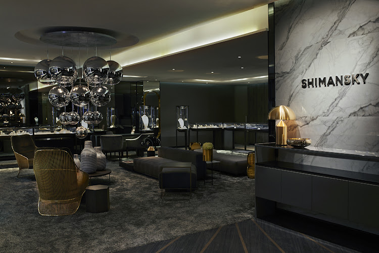 The store features lighting from Tom Dixon and some furniture pieces by Minotti.