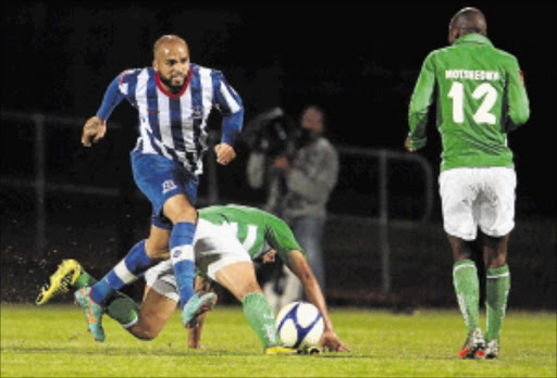 AVAILABLE: Maritzburg United striker Orlando Smeekes, left, is challenged by Bloemfontein Celtic's players during their previous Premiership clash at Harry Gwala Stadium in Pietermaritzburg Photo: Steve Haag/Gallo Images