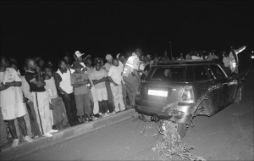 A Mini Cooper owned by Hip Hop artist Jub Jub was involved in a drag race accident in Protea North, Soweto killing four school children instantly. PIC: BAFANA MAHLANGU. 09/03/2010. © Sowetan.