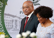 South African President Jacob Zuma (L) and National Assembly speaker Baleka Mbete (R) arrive for the President's State of the Nation Address on February 11, 2016 in Cape Town. Picture Credit: Mike Hutchings