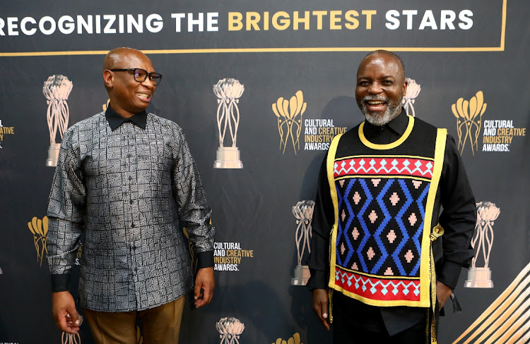 Minister of Sports, Arts and Culture, Zizi Kodwa, and Thebe Ikalafeng during the launch of the inaugural Cultural and Creative Industry Awards (CCIAs).