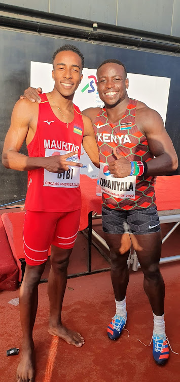 Ferdinand Omanyala with Mauritius' Noa Bibi after the men's 100m final at the Senior Africa Athletics Championship