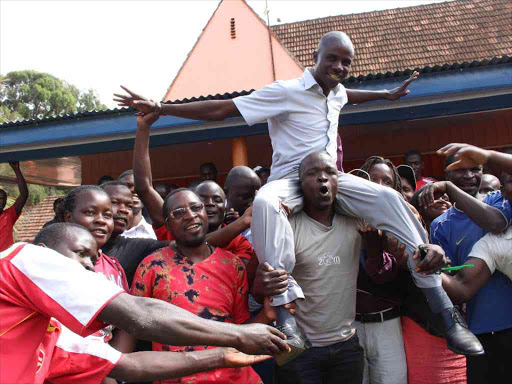 ODM youths from 17 constituencies carry Stephen Mukabana when they stormed Orange House on February 1, demanding the party recognise him as the Nairobi ODM youth leader / COLLINS KWEYU