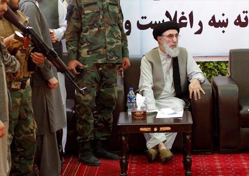Afghan warlord Gulbuddin Hekmatyar (R) arrives to speak to supporters in Laghman province, Afghanistan April 29, 2017. REUTERS