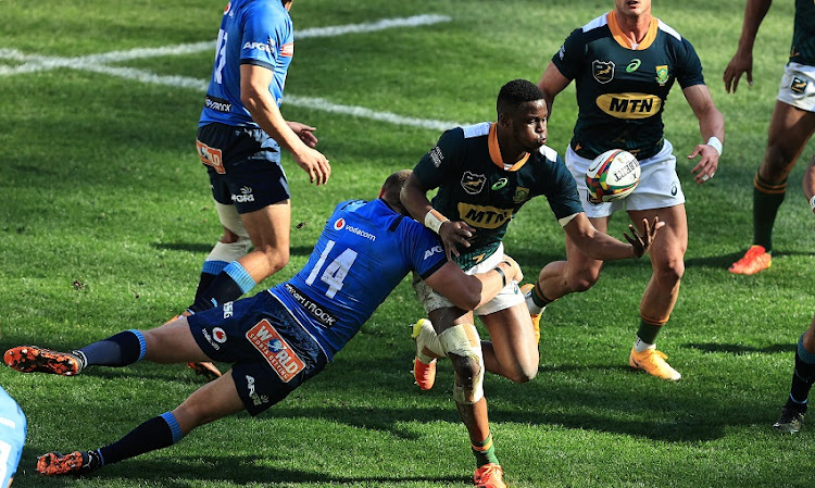 Aphelele Fassi of SA A is tackled by Marco Jansen van Vuren during their match against the Bulls at Cape Town Stadium earlier this year.