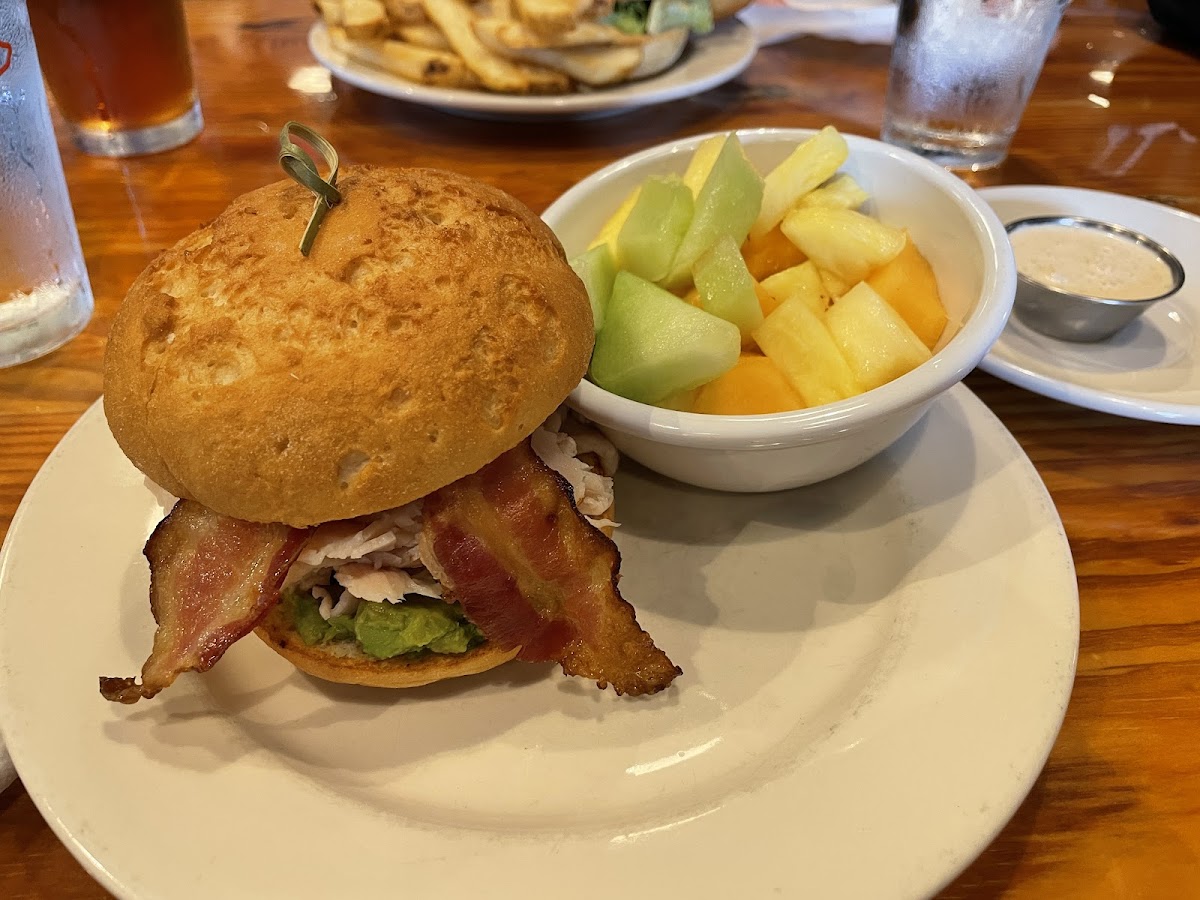 Turkey Bacon Avocado on GF Bun with fresh fruit side