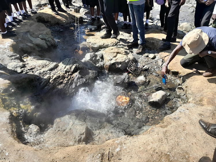 Students immerse eggs to boil in hot geysers in alkaline Lake Bogoria on Saturday, October 29.