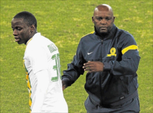 MIXED BAG: Mamelodi Sundowns coach Pitso Mosimane gives instructions to his charge Nyasha Mushekwi during a Premiership matchPhoto: Gallo Images