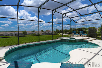 Golf course views from the southwest-facing pool deck of this Highlands Reserve villa