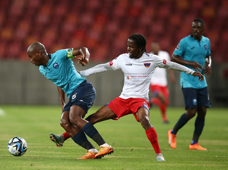 Simphiwe Mcineka of Richards Bay and Kamohelo Mahlatsi of Chippa United vie for the ball during the DStv Premiership match between Chippa United and Richards Bay at Nelson Mandela Bay Stadium on March 06, 2024 in Gqeberha, South Africa.