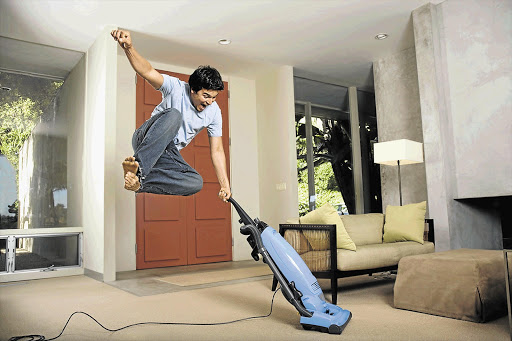 HAPPY ENDING: Vacuuming the carpet on New Year's Eve can be an exhilarating ritual