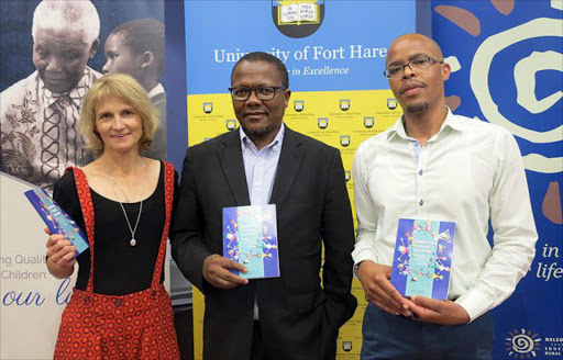 CRUCIAL MATTERS: Authors of ‘Foundation Phase Matters’, Dr Kim Porteus and Dr Brian Ramadiro, at the book launch last week with University of Fort Hare vice-chancellor Sakhela Buhlungu, centre Picture: ARETHA LINDEN