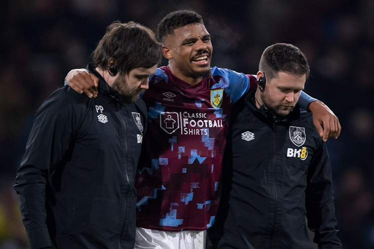 Lyle Foster was assisted off the pitch by medical staff during his side's FA Cup fourth round replay match against Ipswich Town FC at Turf Moor on Tuesday night.