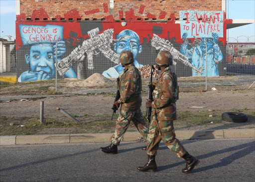 SANDF members patrol the streets of Manenberg on May 21, 2015 in Cape Town in this file photo.