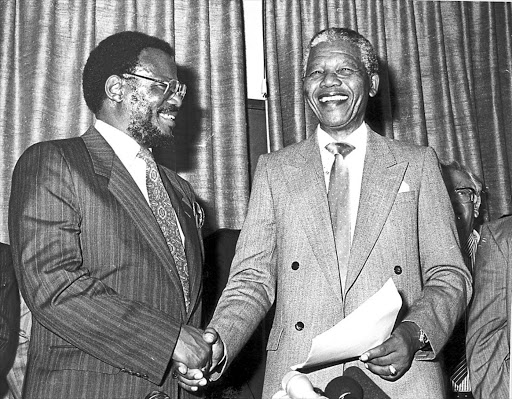 Mangosuthu Buthelezi with Nelson Mandela in the 1990s following his prison release.