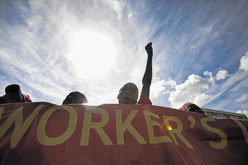 Workers march in the streets of Cape Town. File photo.
