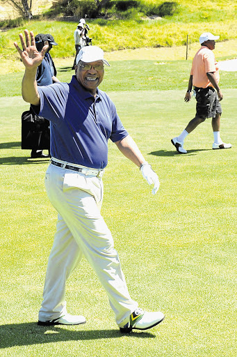 HARD AT WORK FOR THE POOR: President Jacob Zuma at the Presidential Address Golf Challenge, at De Zalze Golf Club, Stellenbosch. Proceeds of the event go to his education trust.