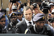 FILLED WITH GUILT: Oscar Pistorius arrives at the Pretoria High Court for the beginning of sentencing yesterday. A correctional services social worker said he was a perfect candidate for correctional supervision and community service