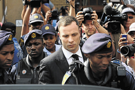 FILLED WITH GUILT: Oscar Pistorius arrives at the Pretoria High Court for the beginning of sentencing yesterday. A correctional services social worker said he was a perfect candidate for correctional supervision and community service