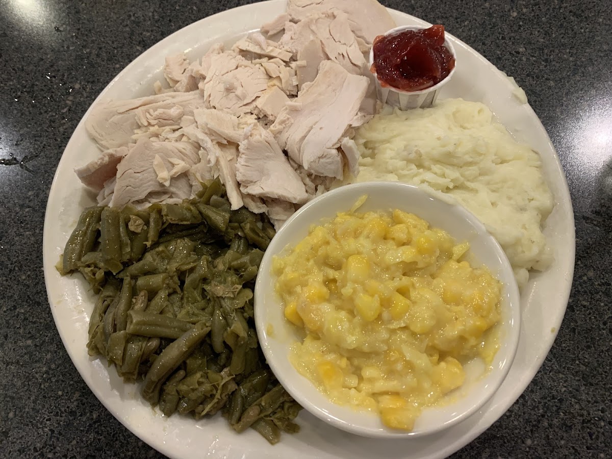 Turkey, cranberry sauce, mashed potatoes, creamed corn, green beans