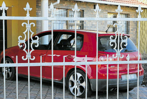 HIGH SPEED CHASE: The Gti with bullets holes Picture: MALIBONGWE DAYIMANI