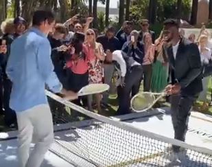 Roger Federer and Siya Kolisi meet across a net at the Belmond Mount Nelson Hotel in Cape Town on February 6 2020.