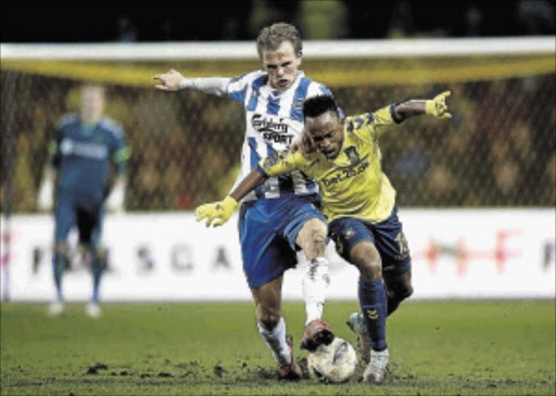 IN FINE FORM: Lebogang Phiri of Brondby holds off Mikkel Desler Photo: Lars Ronbog/ FrontZoneSport via Getty Images