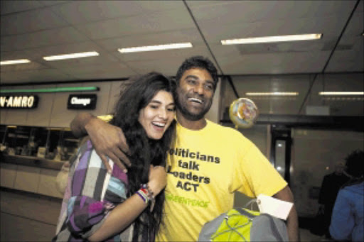 RELIEF: Activist Kumi Naidoo and his daughter, Naomi REUTERS