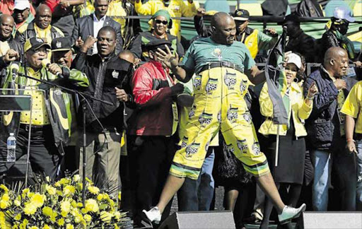 GREAT MOVES: President Jacob Zuma, far left, speaking at the ANC's final pre-election rally, in Johannesburg yesterday Picture: CORNELL TUKIRI/EPA