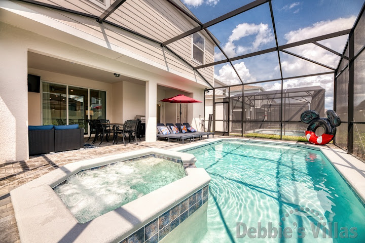 Sun-drenched south-facing pool deck at this Kissimmee vacation villa