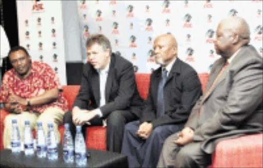 FRONTLINE: PSL chairman Irvin Khoza, chief executive Kjetil Siem, veteran soccer administrator Leepile Taunyane and Safa president Molefi Oliphant at a media briefing in Parktown yesterday. 18/12/08. Pic. Themba Maseko. © Eagency.