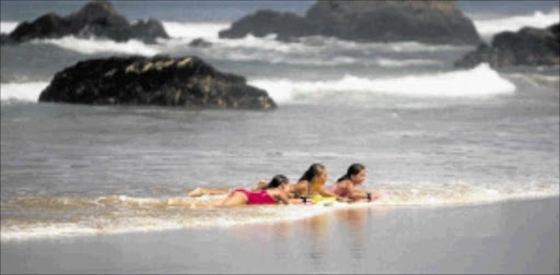 BEACH BABES: Holiday-makers in Plettenberg Bay, about 600km from Cape Town. Photo: Marianne Schwankhart