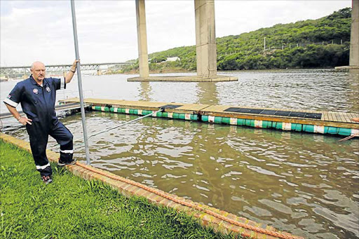 ELF MADE: NSRI East London station commander Geoff McGregor with one of the five new jetties built by the station’s volunteers, who gave up many weekends to complete the task. The station recently received an excellence award from the national body Picture: SINO MAJANGAZA