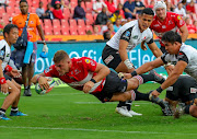 Malcolm Marx scores a try during the Super Rugby match between Emirates Lions and Sunwolves at Emirates Airline Park on March 17, 2018 in Johannesburg, South Africa.