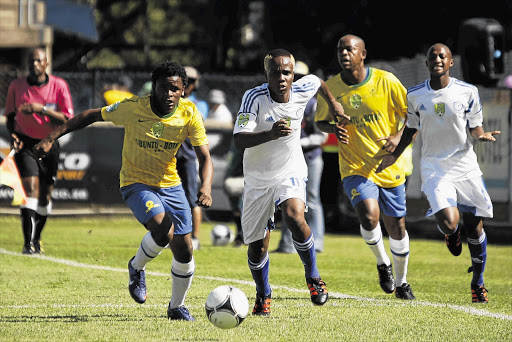 Archivorld Mamapa of Powerlines FC tries to fight back during the Nedbank Cup last 32 match against Mamelodi Sundowns in Kimberley yesterday. Sundowns set numerous records as they annihilated Powerlines 24-0 Picture: DIRK JACOBS/GALLO IMAGES