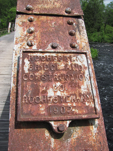  Rochester  Bridge and Construction        Co Rochester, N.Y.      1902 Builder's plaque rapidly approaching illegibility.Found affixed to old bridge (wooden decking!) crossing theWest Branch, St....