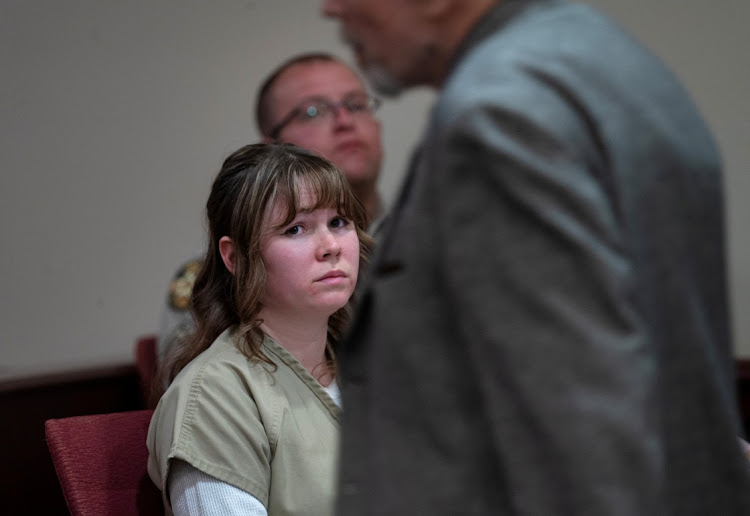 Hannah Gutierrez-Reed, the former armorer at the movie Rust, watches her father Thell Reed leave the podium after he asked the judge not to impose prison time on his daughter, during her sentencing hearing at First District Court, in Santa Fe, New Mexico, US, April 15, 2024.