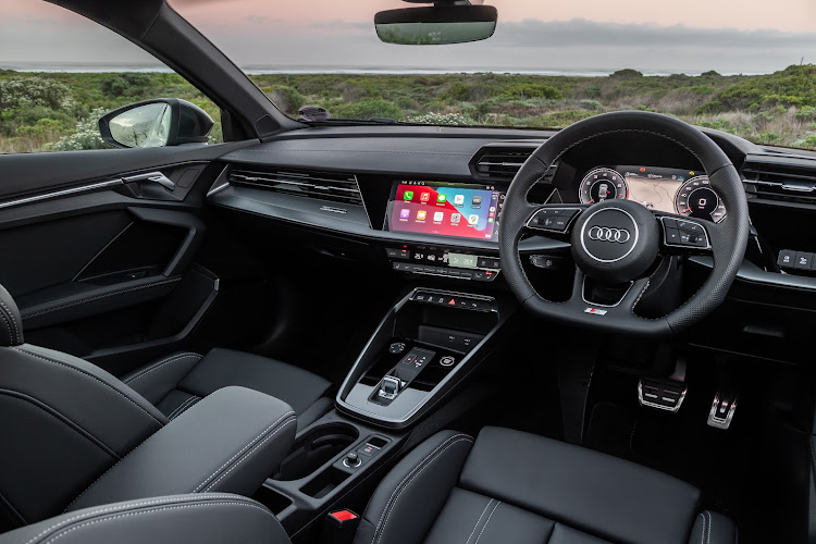 The A3's smart cockpit is more digitalised than its predecessor, and spot the tiny gear lever. Picture: SUPPLIED