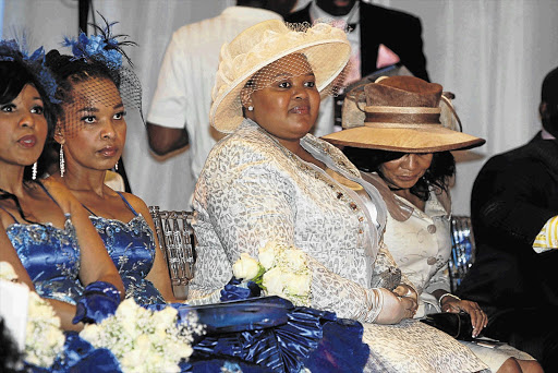 President Jacob Zuma's wife Mantuli looks on as Zanele Mbokazi and Bishop Mpendulo Nkambule take their vows
