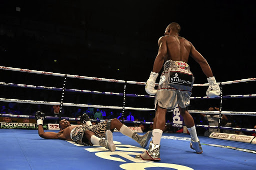 Zolani Tete knocks out Siboniso Gonya with his first punch in their WBO bantamweight title fight in Belfast, Northern Ireland, on Saturday night. /Charles McQuillan/Getty Images