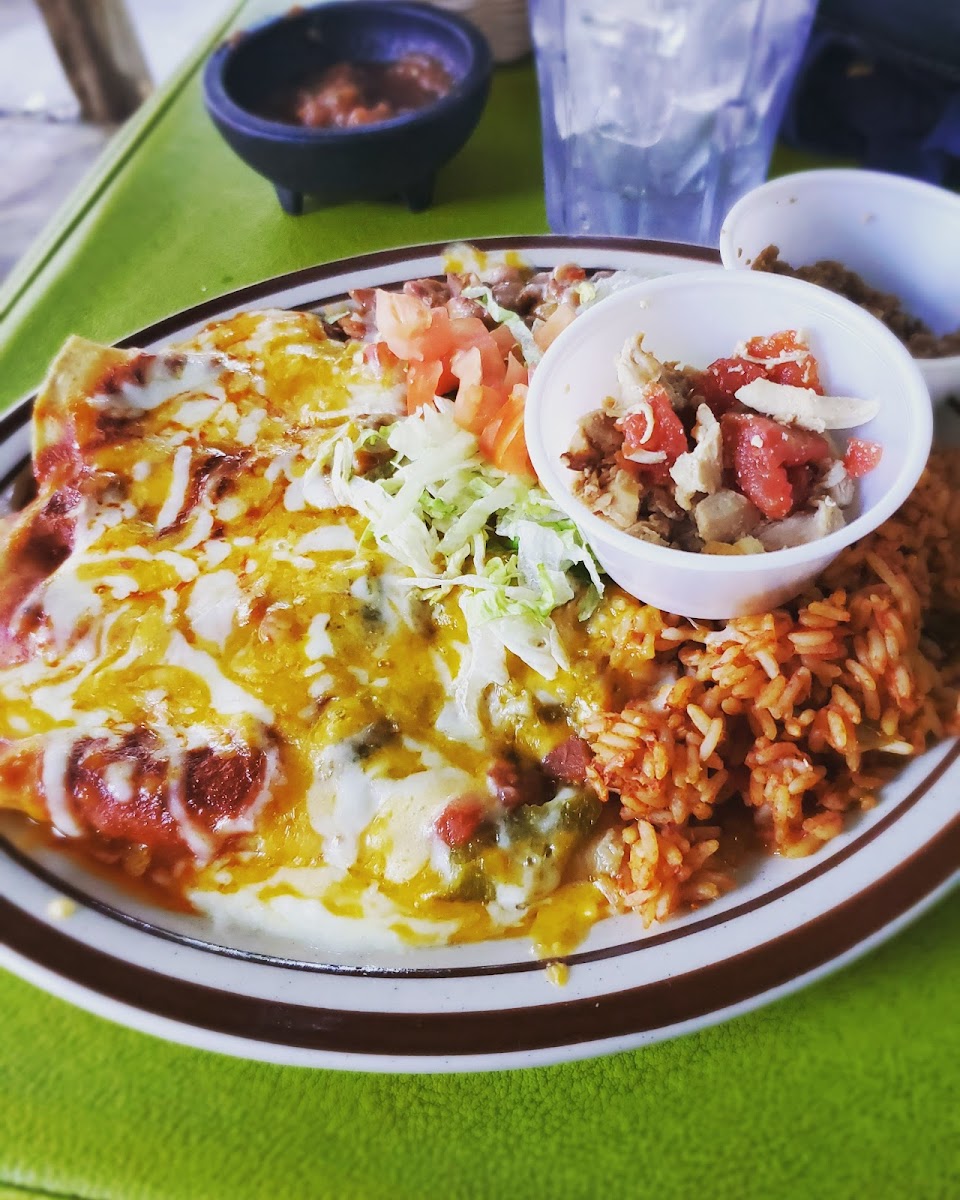 Cheese enchiladas smothered in "Christmas," and brought a cup of chicken and beef to try