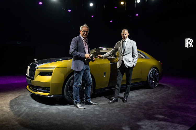 Mark Smyth with Rolls-Royce's design director Anders Warming at the official unveiling of the Rolls-Royce Spectre.