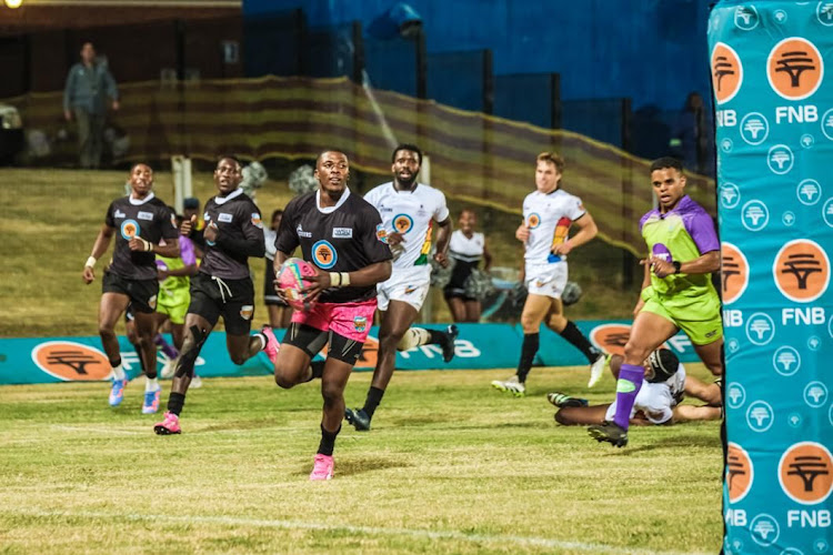 WSU All Blacks captain Awonke Sondishe crosses over the line for a try against UKZN at the Sisa Dukashe Stadium.