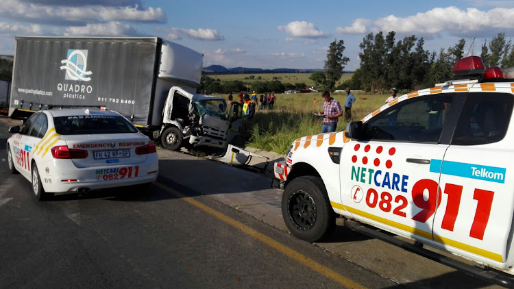 A truck driver is in a critical condition after a stone-throwing incident led to his truck crashing into another vehicle near Lanseria airport.
