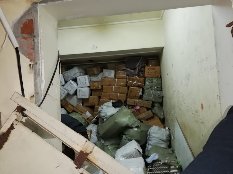 Counterfiet goods and weapons were confiscated and undocumented foreigners arrested as police raided buildings in the Johannesburg CBD on Wednesday, August 7 2019.
